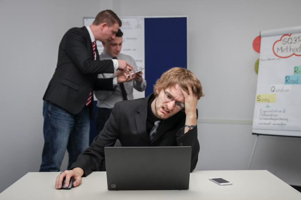 Employer reviewing workplace policies to avoid costly employment lawsuits